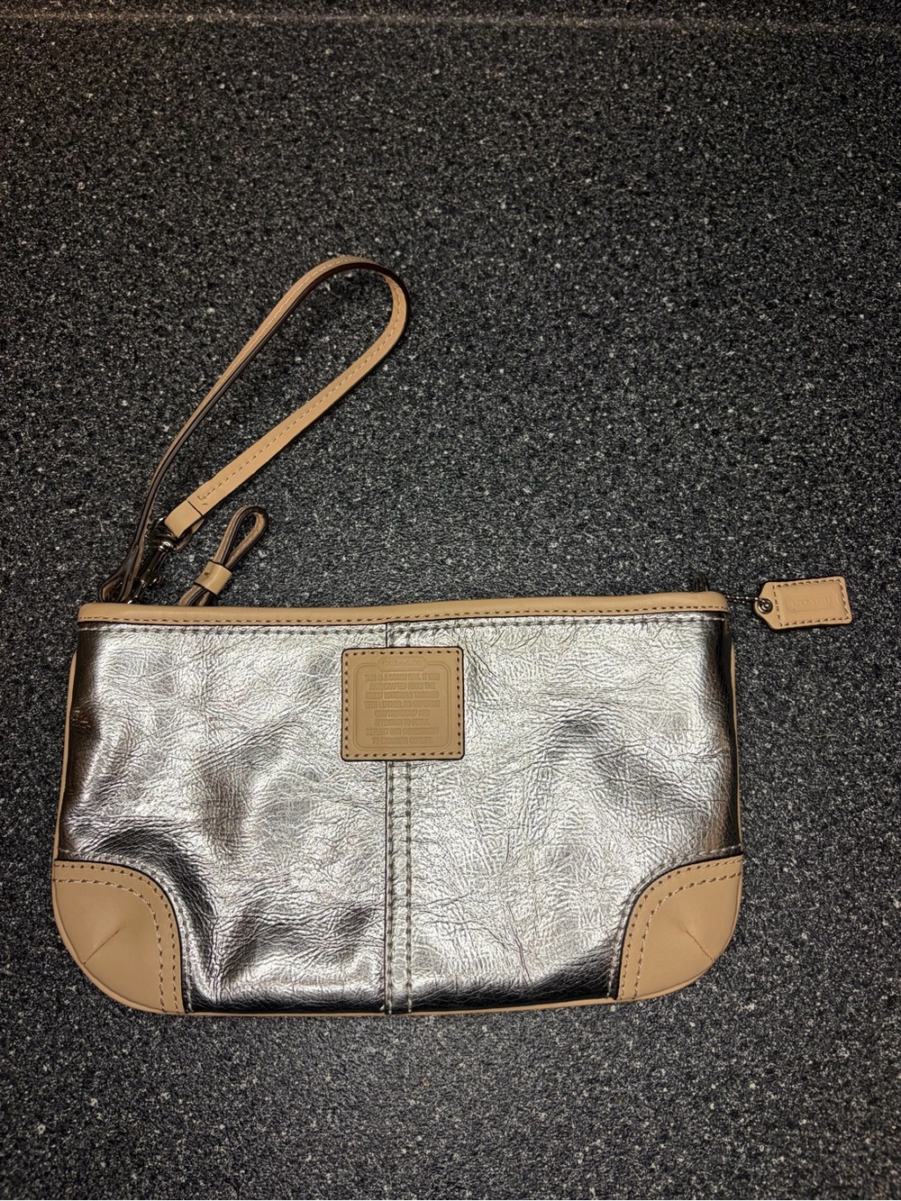 Coach Metallic Silver Wristlet with Tan Leather Trim